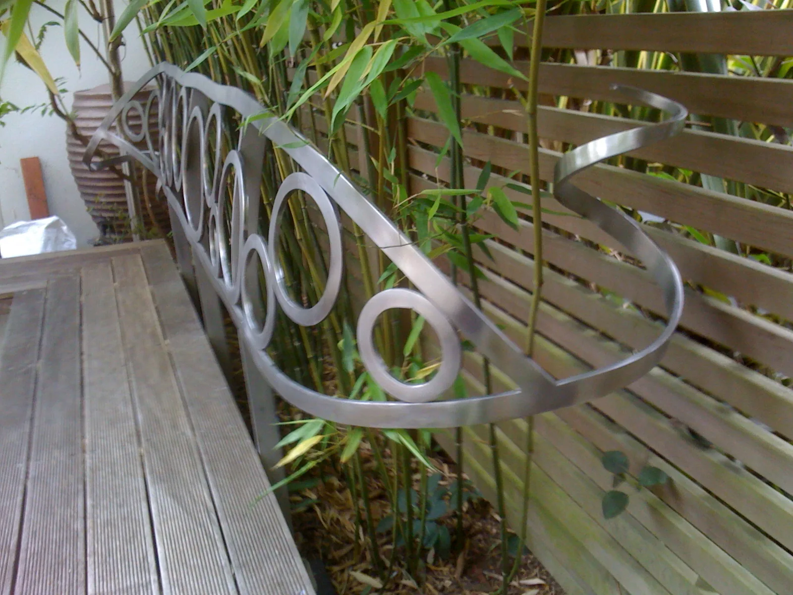 Stainless steel sculpted back rest, photo 2 of 3